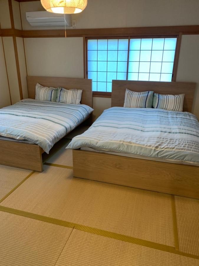 Guest House Apple Osaka Buitenkant foto