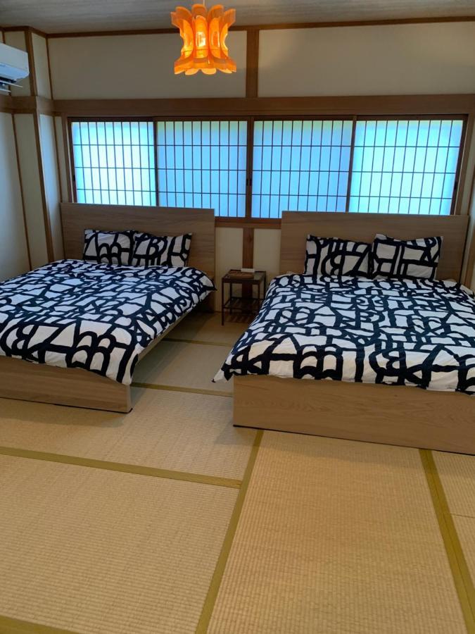 Guest House Apple Osaka Buitenkant foto